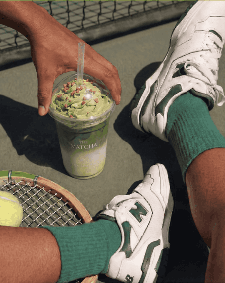 MatchUP performance matcha with a tennis court at golden hour